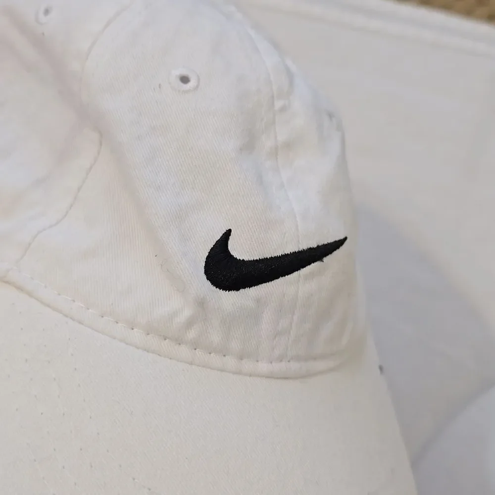 Bundle of 2 girls nike and tommy bahama caps